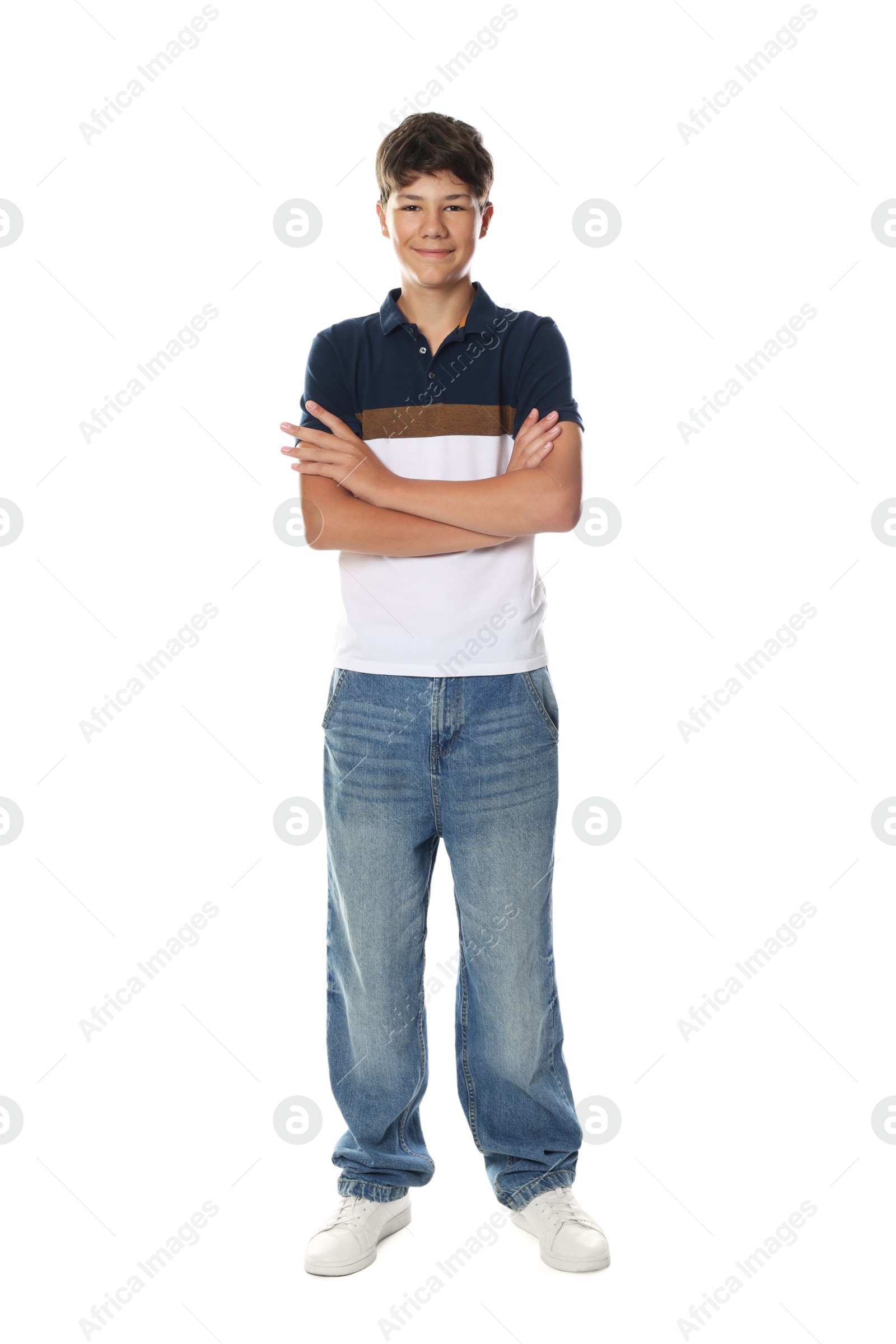 Happy teenage boy posing on white background Photo of Happy teenage boy posing on white background