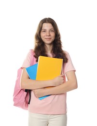 Photo of Cute teenage girl with backpack and notebooks on white background