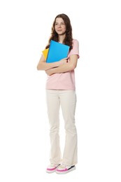 Photo of Cute teenage girl with notebooks on white background