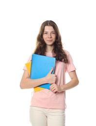 Photo of Cute teenage girl with notebooks on white background