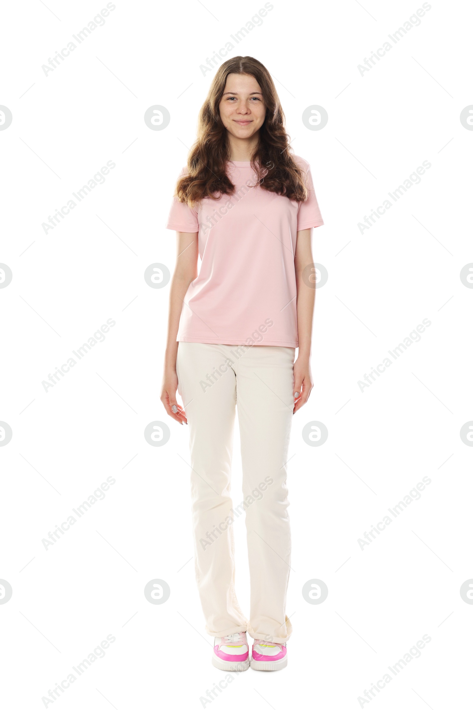 Happy teenage girl posing on white background Photo of Happy teenage girl posing on white background