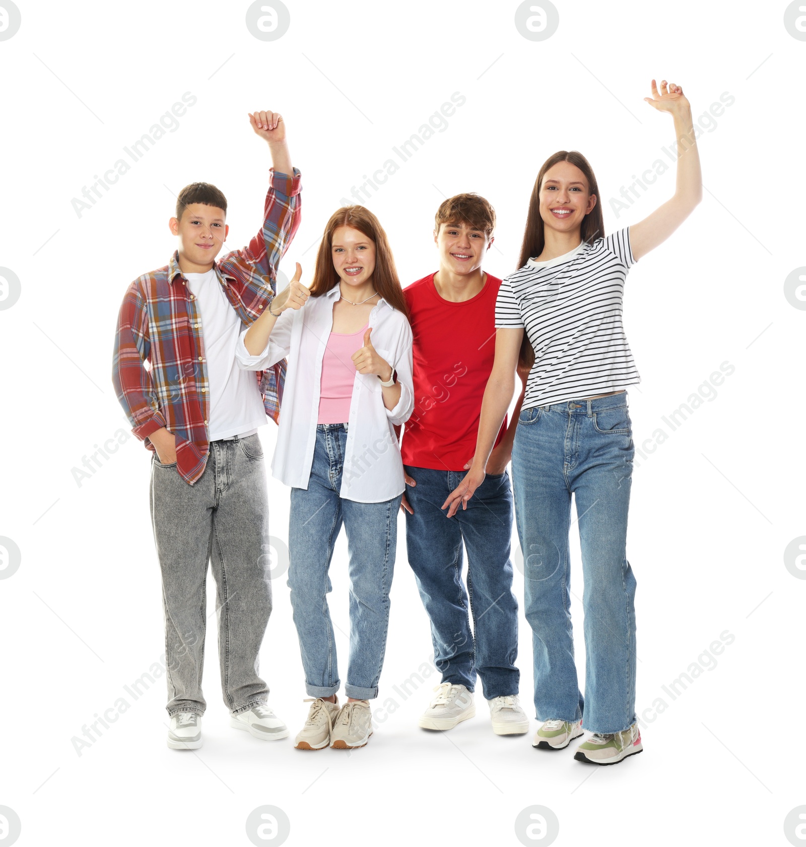 Excited teenagers posing together on white background Photo of Excited teenagers posing together on white background