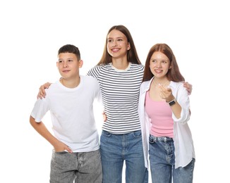Photo of Happy teenagers posing together on white background