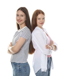 Photo of Cute teenage girls posing together on white background