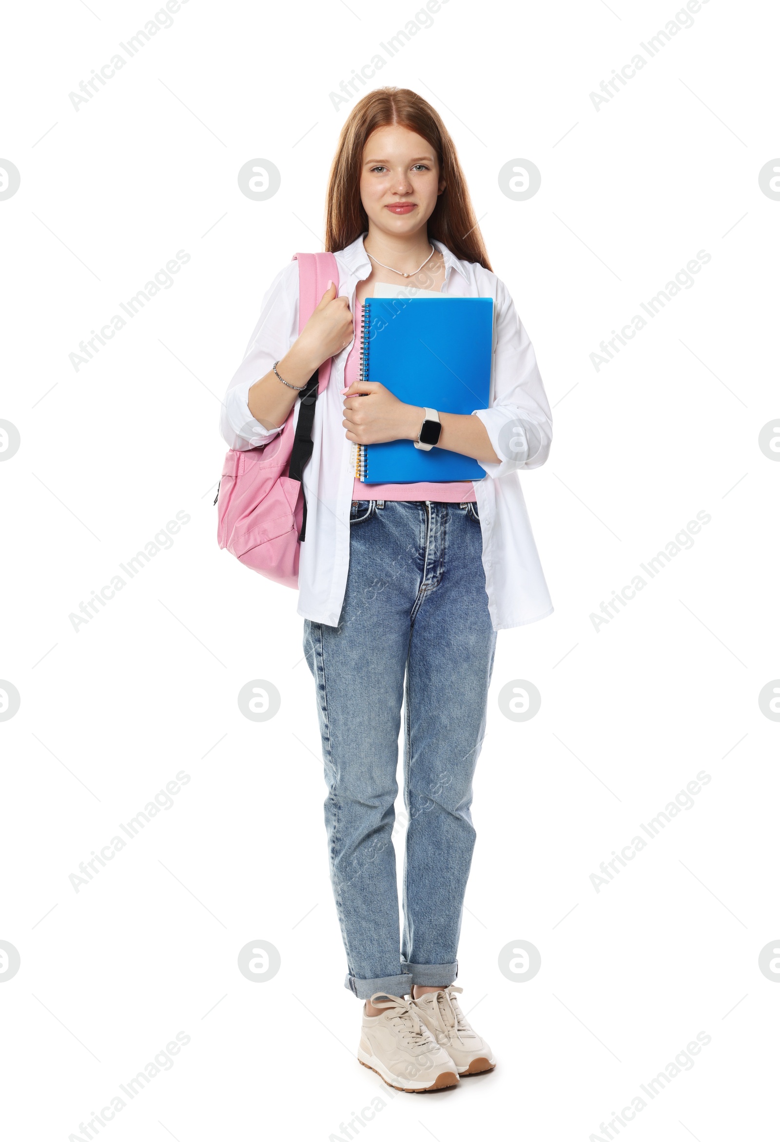 Photo of Cute teenage girl with backpack and notebooks on white background