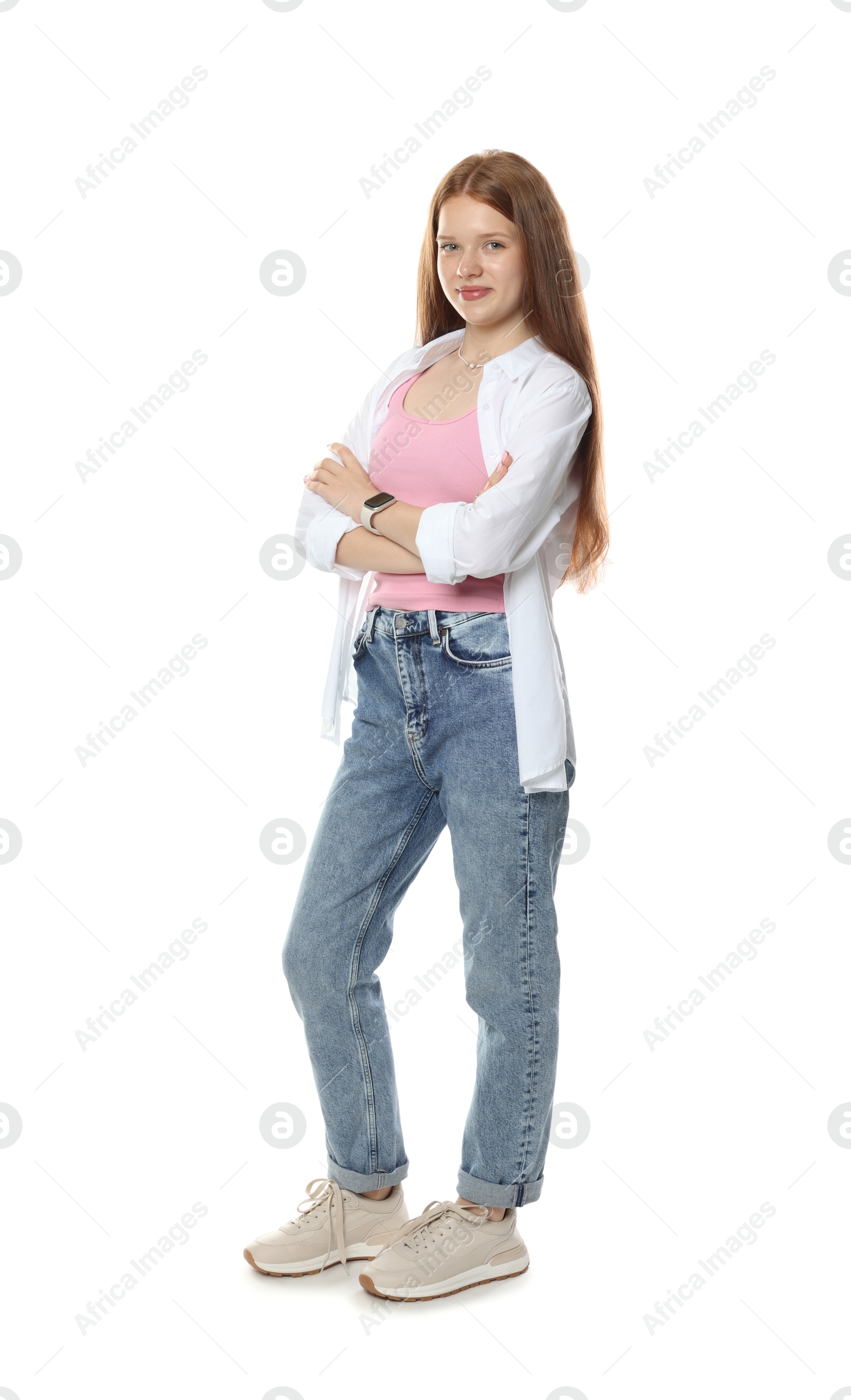 Happy teenage girl posing on white background Photo of Happy teenage girl posing on white background