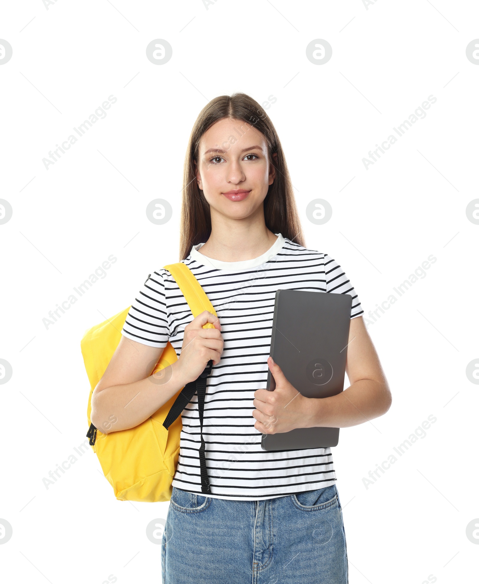 Beautiful teenage girl with backpack and laptop on white background Photo of Beautiful teenage girl with backpack and laptop on white background