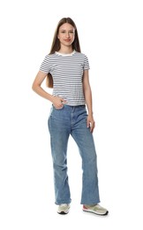 Photo of Happy teenage girl posing on white background