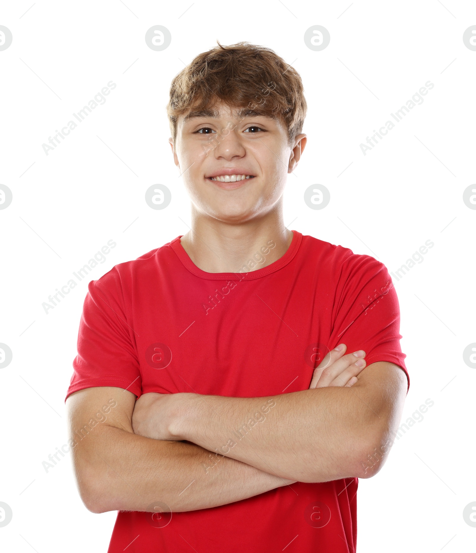 Happy teenage boy posing on white background Photo of Happy teenage boy posing on white background
