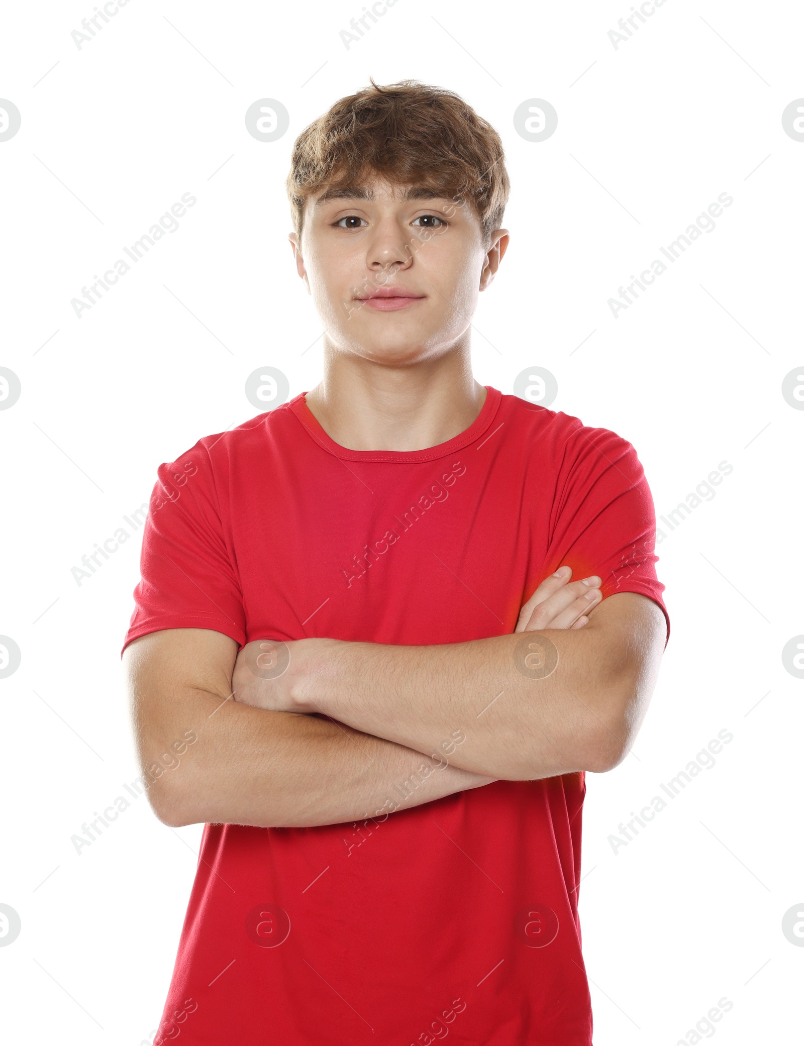 Happy teenage boy posing on white background Photo of Happy teenage boy posing on white background