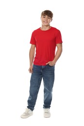 Photo of Happy teenage boy posing on white background