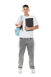 Photo of Teenage boy with backpack and laptop on white background