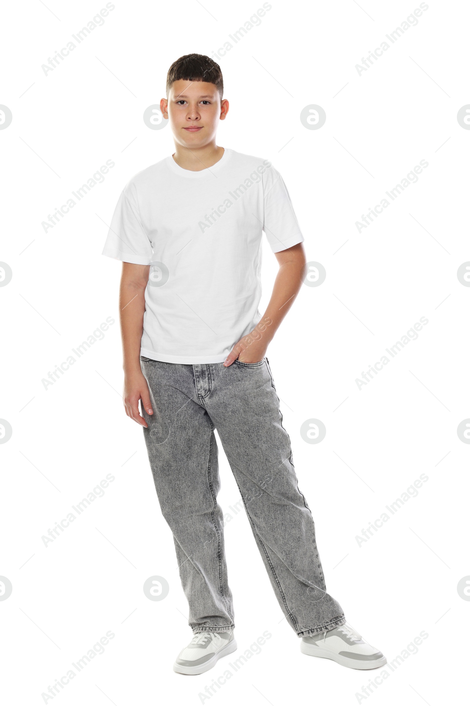 Happy teenage boy posing on white background Photo of Happy teenage boy posing on white background