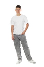 Photo of Happy teenage boy posing on white background