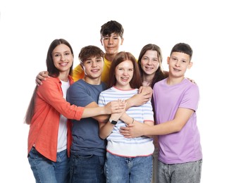 Photo of Group of happy teenagers posing on white background
