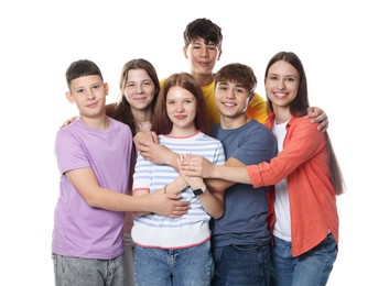 Photo of Group of happy teenagers posing on white background