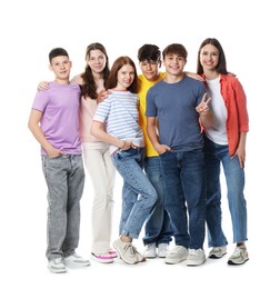 Photo of Group of happy teenagers posing on white background