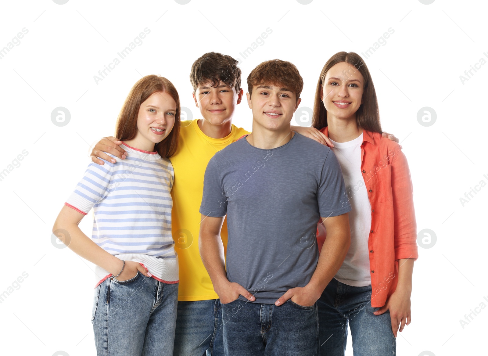 Group of happy teenagers posing on white background Photo of Group of happy teenagers posing on white background