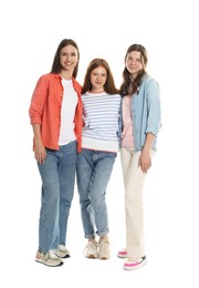 Photo of Happy teenage girls posing on white background