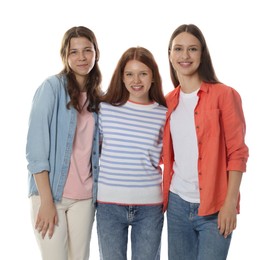 Photo of Happy teenage girls posing on white background