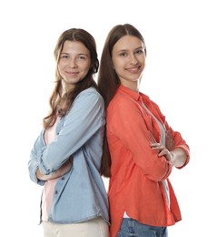 Photo of Happy teenage girls posing on white background
