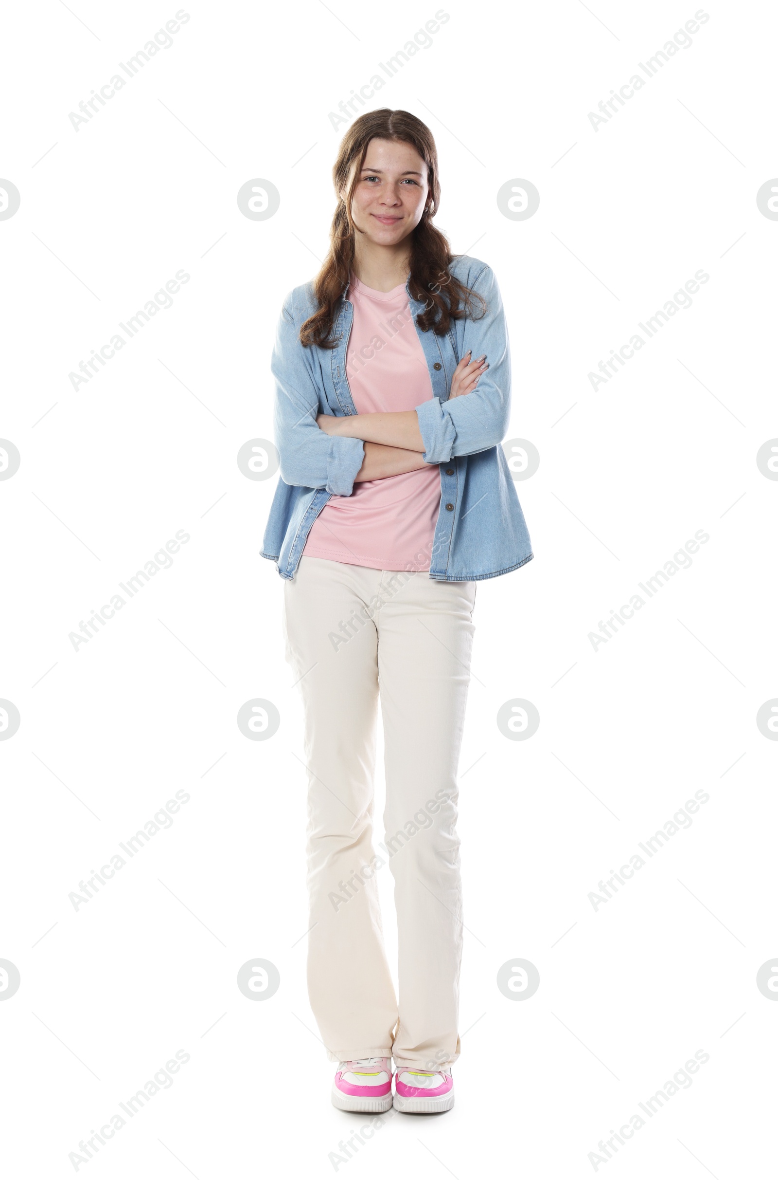 Beautiful teenage girl posing on white background Photo of Beautiful teenage girl posing on white background