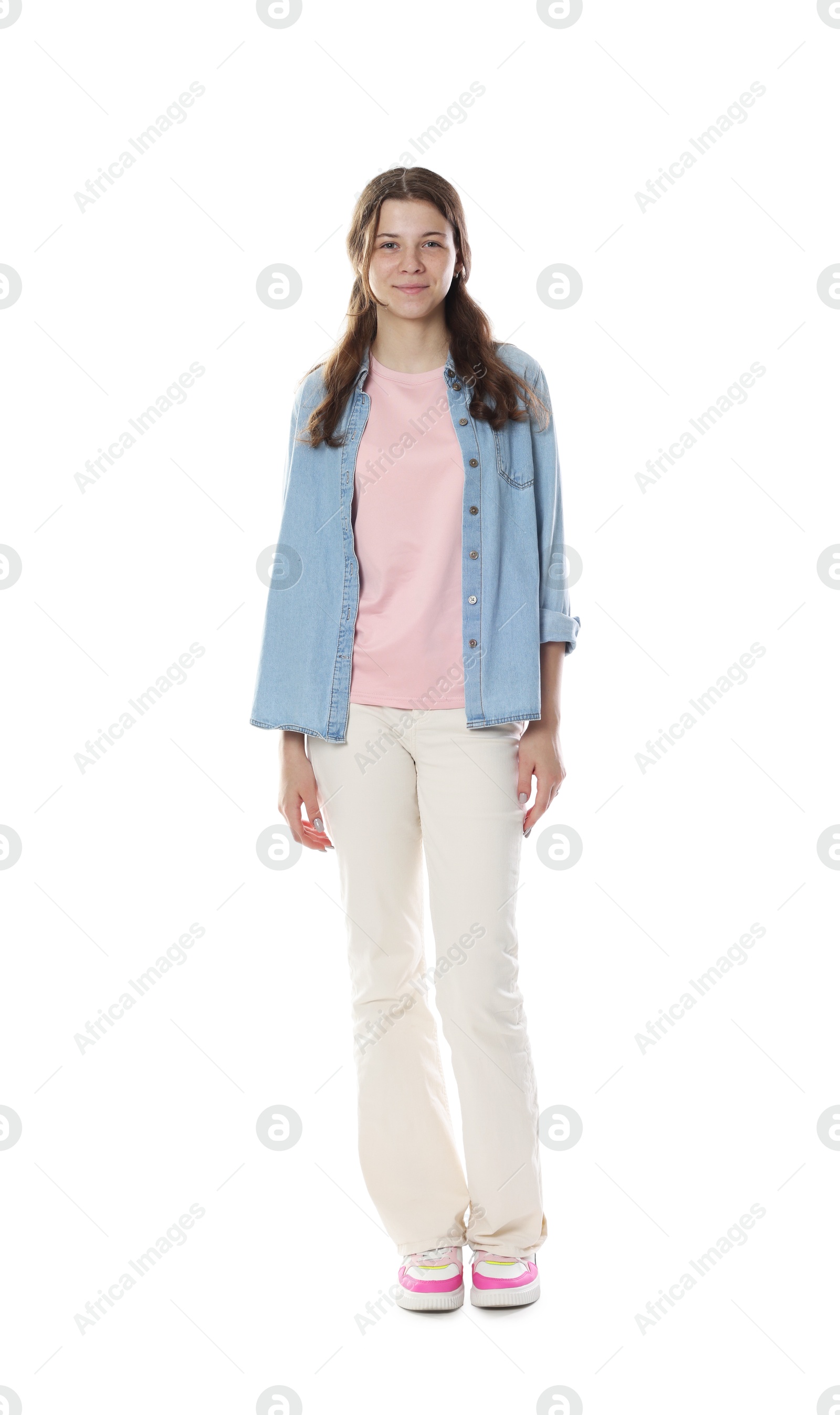 Beautiful teenage girl posing on white background Photo of Beautiful teenage girl posing on white background