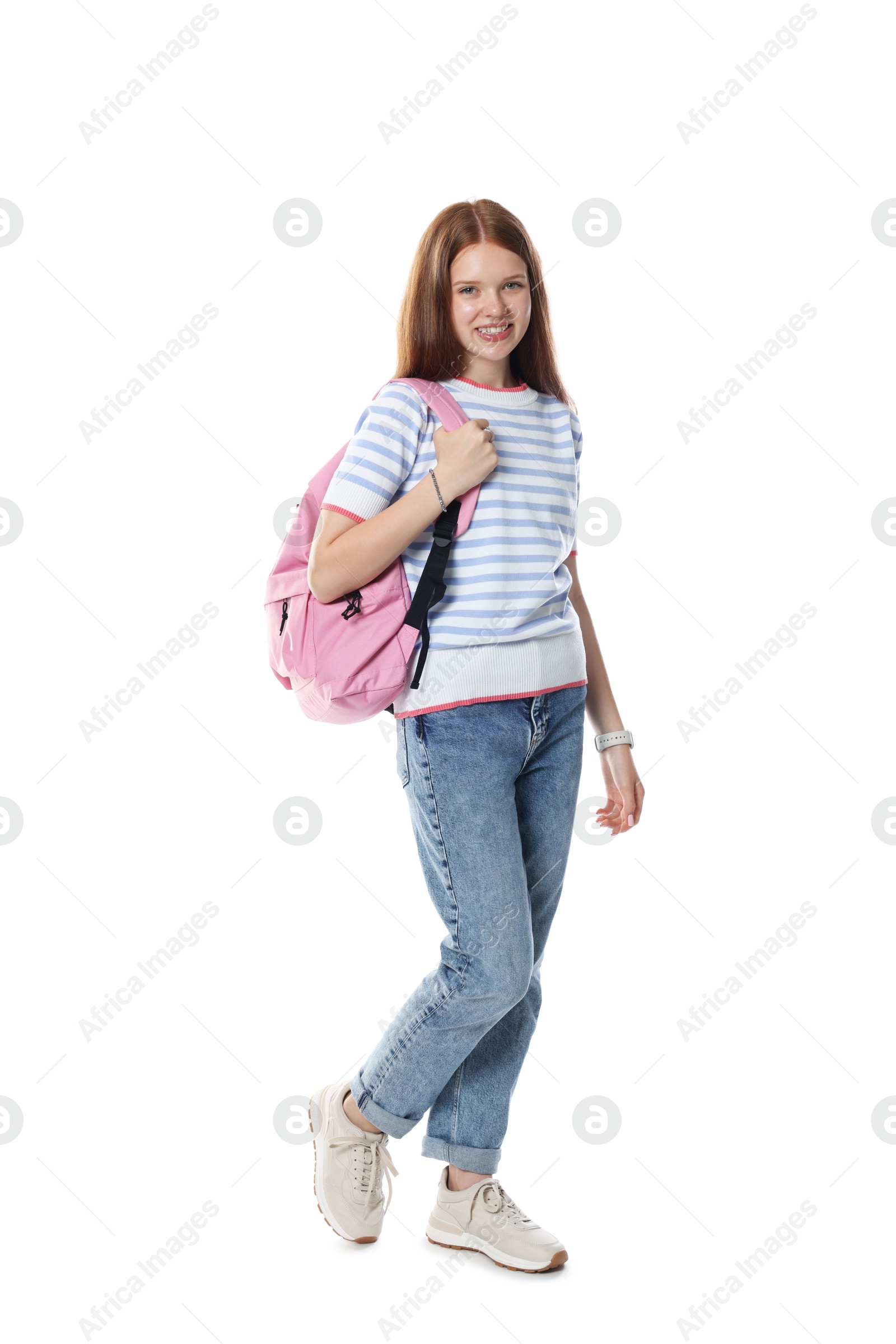 Happy teenage girl with backpack on white background Photo of Happy teenage girl with backpack on white background