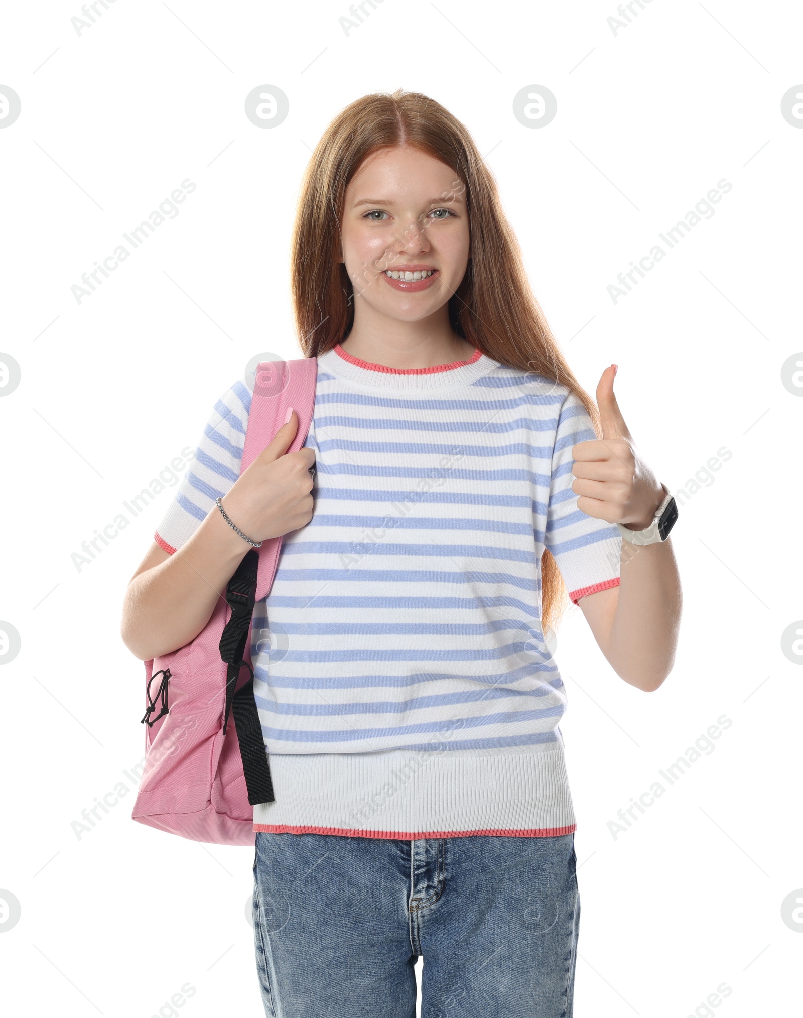 Happy teenage girl with backpack showing thumbs up on white background Photo of Happy teenage girl with backpack showing thumbs up on white background