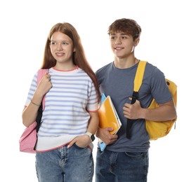 Photo of Teenage girl and boy with backpacks and notebooks on white background
