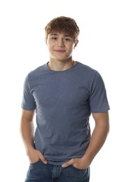 Photo of Cute teenage boy posing on white background