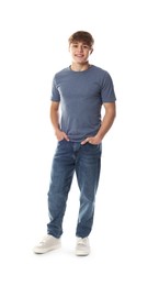 Photo of Cute teenage boy posing on white background