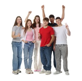 Photo of Group of excited teenagers posing on white background