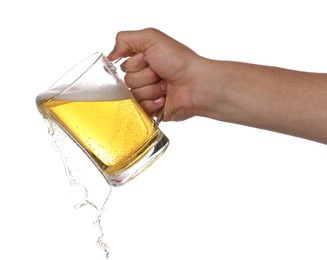 Photo of Man pouring tasty beer from glass mug on white background, closeup
