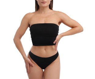 Photo of Fit woman with perfect body on white background, closeup