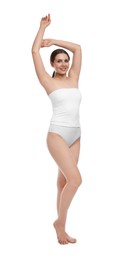 Photo of Beautiful woman in underwear on white background