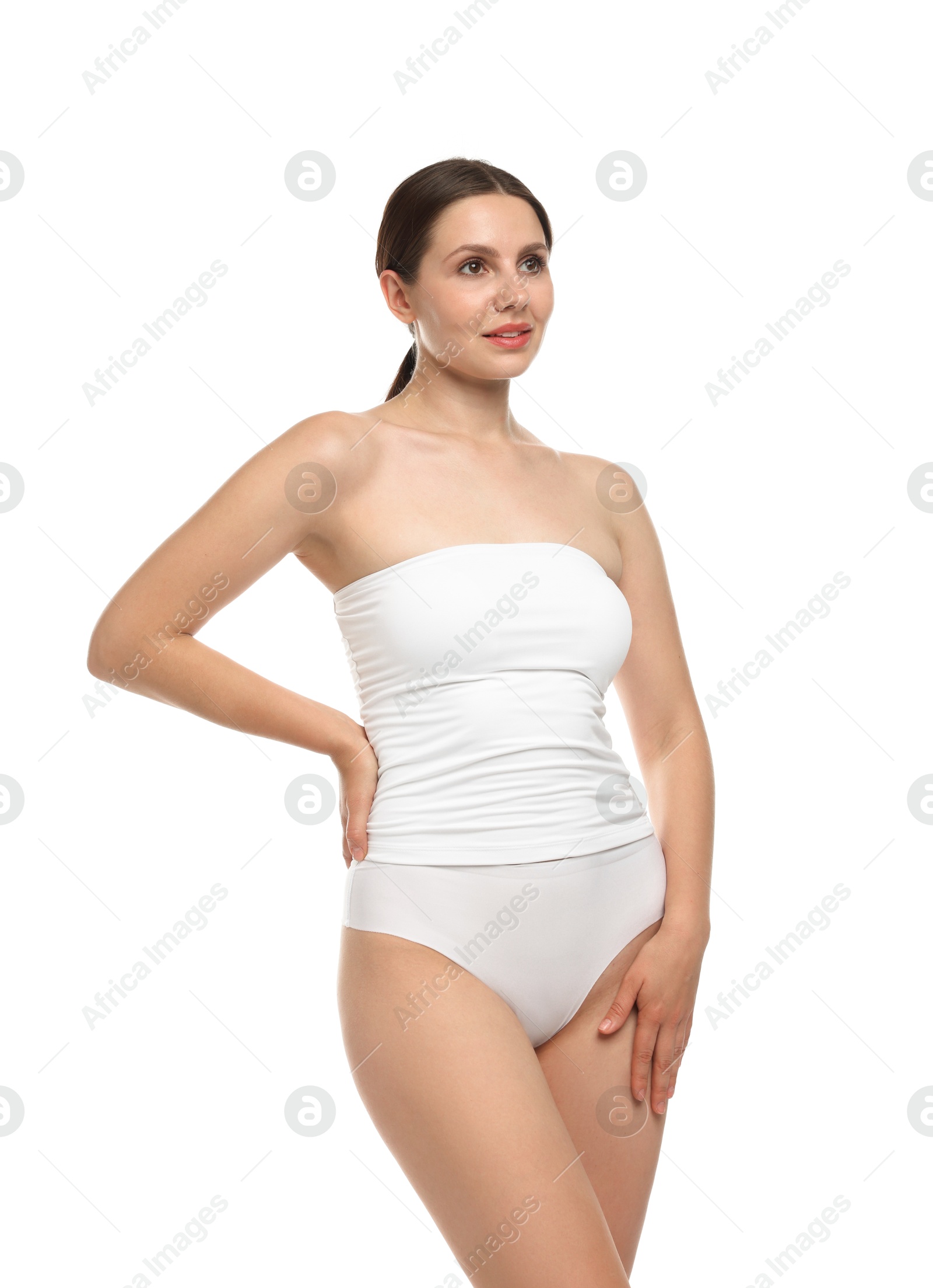 Beautiful woman in underwear on white background Photo of Beautiful woman in underwear on white background