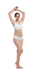 Photo of Beautiful woman in underwear on white background