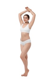 Photo of Beautiful woman in underwear on white background