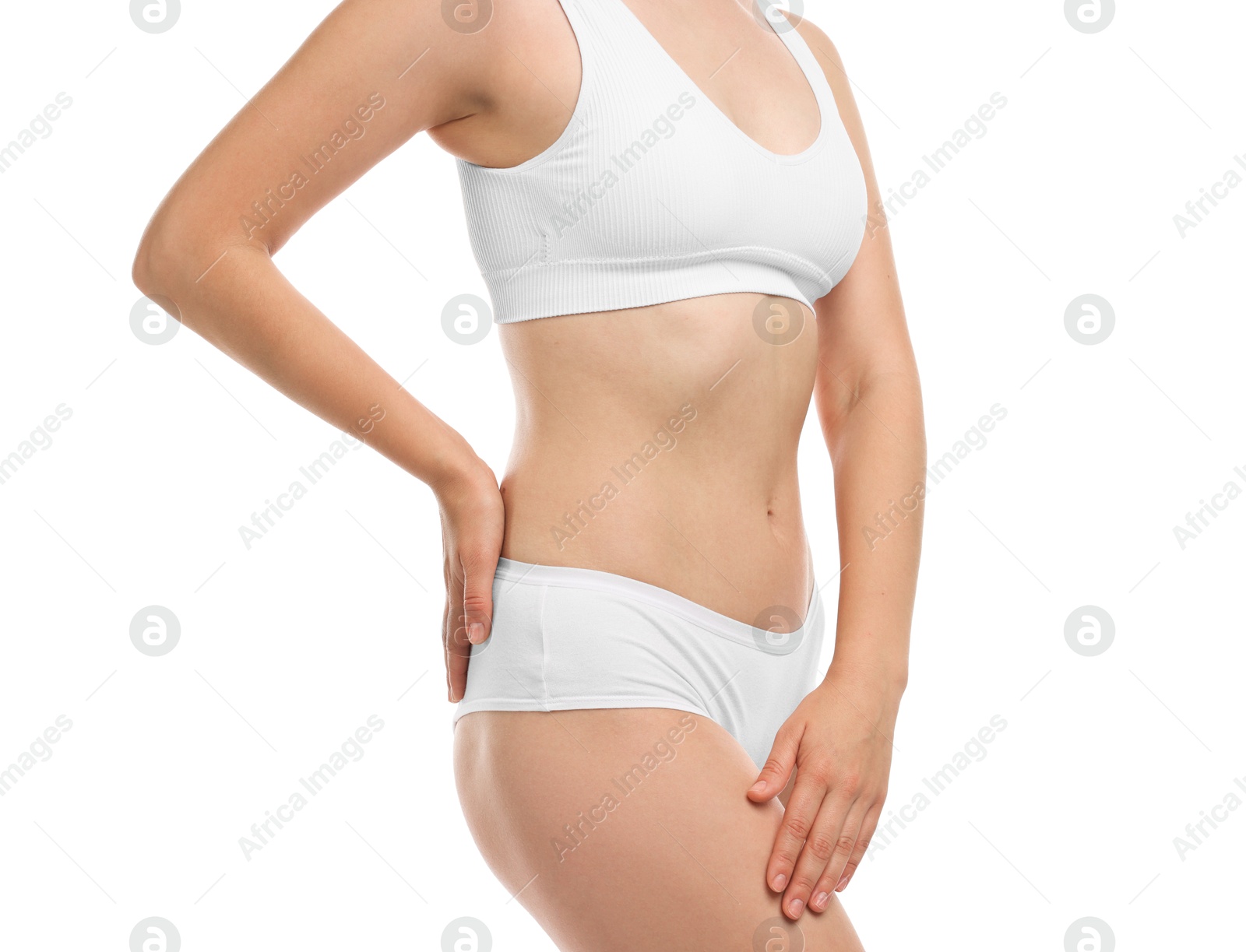 Woman in underwear on white background, closeup Photo of Woman in underwear on white background, closeup