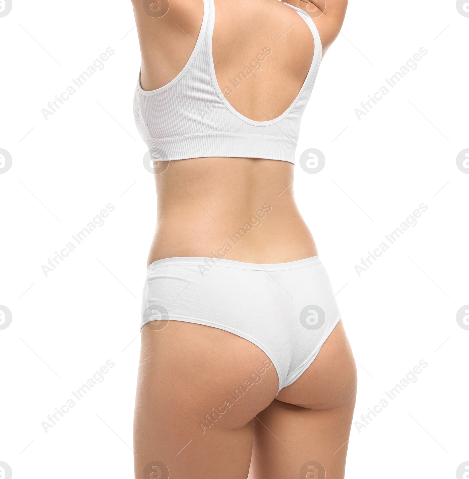 Woman in underwear on white background, closeup Photo of Woman in underwear on white background, closeup