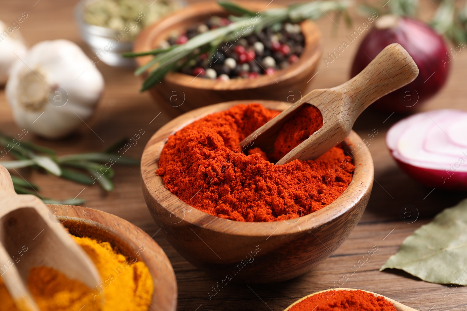 Different aromatic spices on wooden table, closeup Photo of Different aromatic spices on wooden table, closeup