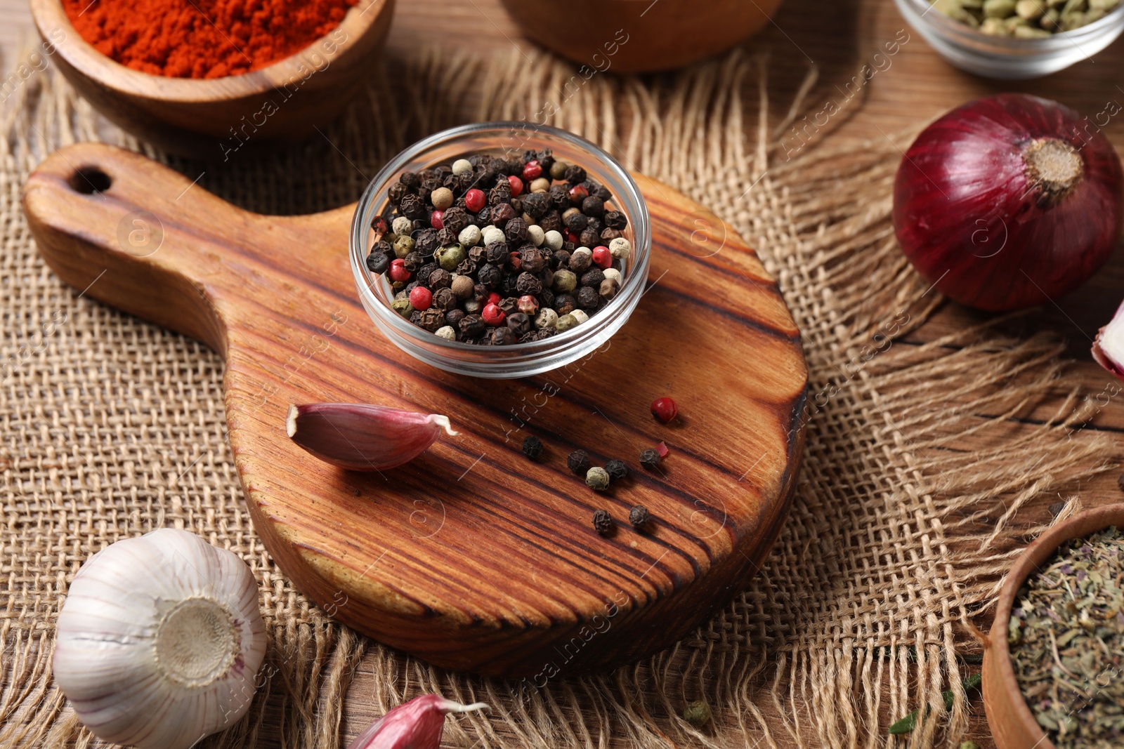 Different aromatic spices on wooden table, closeup Photo of Different aromatic spices on wooden table, closeup