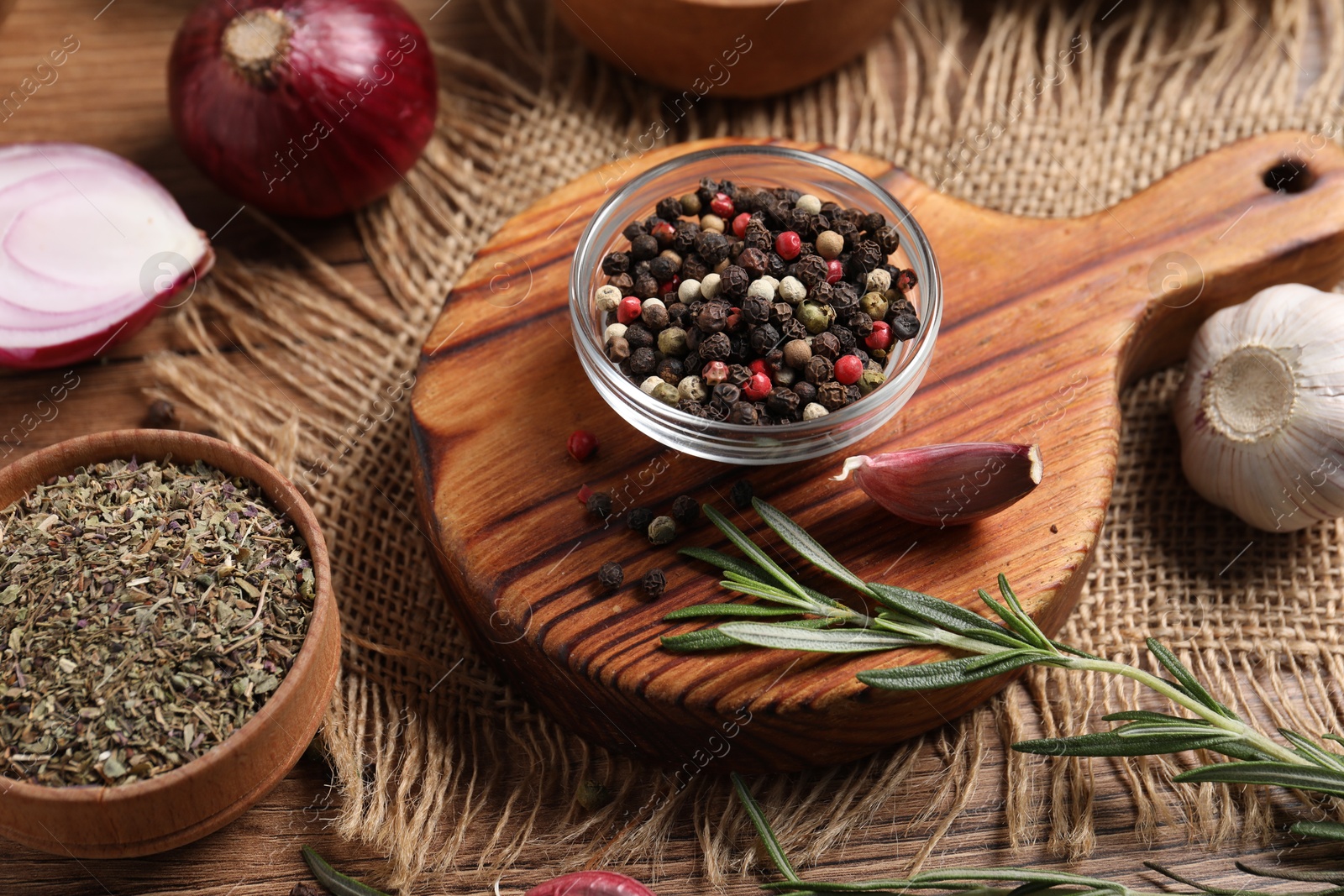 Different aromatic spices on wooden table, closeup Photo of Different aromatic spices on wooden table, closeup