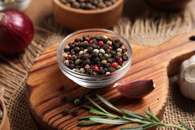 Photo of Different aromatic spices on table, closeup view