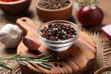Photo of Different aromatic spices on table, closeup view