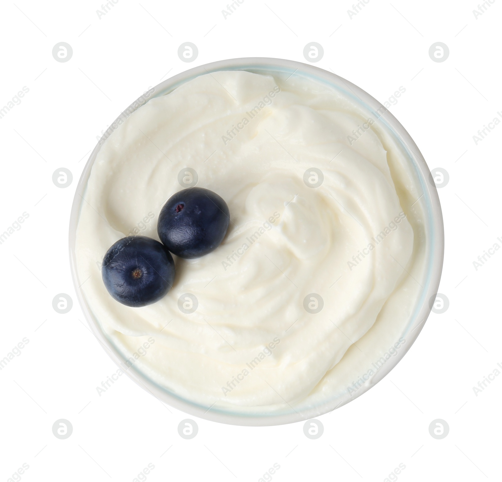 Photo of Delicious yogurt with blueberries in bowl isolated on white, top view