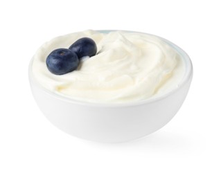 Photo of Delicious yogurt with blueberries in bowl isolated on white