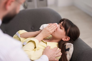 Photo of Psychologist supporting patient during therapy session in office, selective focus