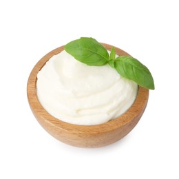 Photo of Delicious yogurt with basil in bowl isolated on white